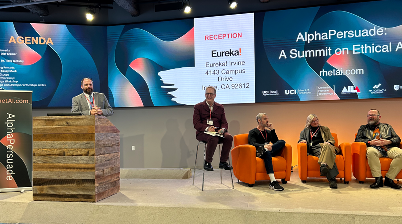 A photograph from AlphaPersuade: A Summit on Ethical AI, featuring Dean Miller and Jonathan Alexander.