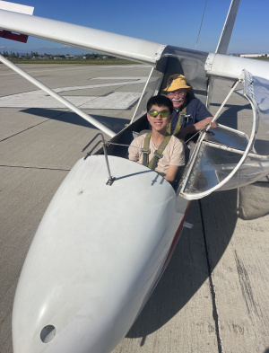 Clovis Hung in an airplane